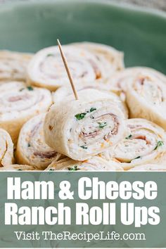 ham and cheese ranch roll ups in a green bowl with text overlay that reads, ham and cheese ranch roll ups