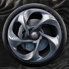 an image of a car wheel with holes in the center and spokes on it