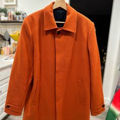 Never Used Without Tags. H&M Coat In Orange, Size 44r 4 Button Closure; Slash Pockets At Front; 2 Inside Pockets 42 Inches From Collar To Seam. Fully Lined. 52% Cotton, 31% Polyester, 17% Wool Fits Like A Large/Xl Fitted Orange Outerwear With Notch Lapel, Tailored Long Sleeve Orange Outerwear, Classic Long Sleeve Orange Outerwear, H&m Collared Fall Outerwear, H&m Collared Outerwear For Fall, Classic Orange Outerwear For Spring, Fitted Orange Outerwear With Button Closure, Orange Single Breasted Long Sleeve Outerwear, Orange Single-breasted Long Sleeve Outerwear