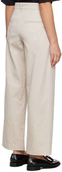 Cotton gabardine trousers. · Belt loops · Four-pocket styling · Zip-fly · Creased legs Supplier color: Ecru Beige Wide-leg Cargo Pants For Work, Chic Beige Tapered Leg Cargo Pants, Chic Beige Chinos For Work, Beige Ankle-length Cargo Pants For Work, Spring Beige Chinos With Belt Loops, Beige Chinos With Belt Loops For Spring, Chic Beige Tapered Leg Chinos, Beige Ankle-length Chinos For Work, Beige Tapered Leg Chinos For Work