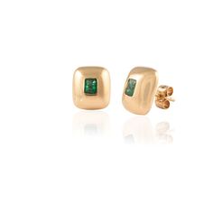 This pair of earrings is set in 14K Yellow Gold, studded with green emeralds. An ideal gift for your loved ones. -Material - 14K Solid Yellow Gold -Gemstone - Natural Emerald -Gemstone weight - 0.710 ct -Gross weight - 6.0 grams Wearing an emerald stone, also known as panna or zammrud brings in intellectual progress. Natural intelligence and intellect is the domain of Planet Mercury and enhancing this planets power brings in better understanding of life, a balanced perspective and better ability Modern Green Earrings For May Birthstone, Modern Green May Birthstone Earrings, Formal Emerald Earrings With Birthstone, Formal Emerald Birthstone Earrings, Modern Green Earrings For Anniversary, Modern Earrings With May Birthstone Gemstone, Yellow Gold Emerald Birthstone Earrings, 14k Gold Green Earrings, Modern Emerald Gemstone Earrings