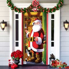 santa clause door cover with christmas decorations on the front and side doors, in front of a house