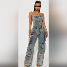 Fashion Nova Denim Non Stretch Jumpsuit Wide Leg Cargo Pants Inseam 33" Tube Button Down 100% Cotton Fitted Denim Cargo Jeans For Summer, High Rise Denim Blue Utility Jumpsuit, High Rise Denim Jumpsuit With Button Closure, Utility Blue Denim Jumpsuit, Blue Denim Utility Jumpsuit, High Rise Denim Utility Jumpsuits And Rompers, High Rise Denim Jumpsuits And Rompers With Pockets, Utility High Rise Denim Jumpsuits And Rompers, Denim High-rise Jumpsuits And Rompers With Pockets