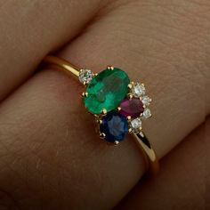 Description Multi Stone Ring Natural Blue Sapphire Emerald Ruby Gemstone Cluster Ring Solid 14K Yellow Gold SI Clarity G-H Color Diamond Stackable Ring Handmade Jewelry, Wedding Ring, Engagement Ring ≫ Features * Items Code: SPBR00536/SGR02171  * Metal: 14K Solid Gold (18K also available - Additional fees may apply) * Solid 14K Yellow Gold with stamped * More options in gold color: Rose gold, yellow gold, White gold * Diamonds Wt: 0.093 Ct. * Diamond Color: G-H * Diamonds Clarity: SI * Diamonds Multi Color Stone Ring, Sapphire And Ruby Ring, Birthstone Ring Mothers, Colored Stone Rings, Multi Gemstone Ring, Rainbow Jewelry, Dream Engagement Rings, Stackable Ring, Natural Blue Sapphire