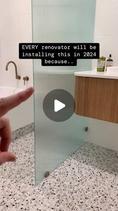 someone is pointing at the glass door in their bathroom that says, every renovat will be installing this in 2020 because