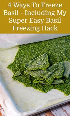 fresh basil leaves on a baking sheet with text overlay that reads 4 ways to freeze basil - including my super easy basil freezing hack