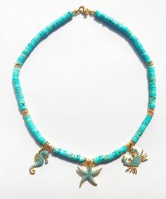 Turquoise Beaded Choker, Turquoise Beaded Necklace, Turquoise Charm Necklace, Bridesmaid Jewelry, Gift for Women, Turquoise Charm Pendant ' Korfu Necklace' ' Large size turquoise natural stone & 24 K Gold Plated Charms '  Shine with your special jewelry  Each design is unique. As a store, we do not do mass production. Please see the rest of my collection here: https://victoriadesignstoree.etsy.com Beaded Turquoise Necklace For Beach, Ocean-inspired Turquoise Beaded Necklaces As Gift, Ocean-inspired Turquoise Beaded Necklaces For Gifts, Turquoise Ocean-inspired Necklace With Natural Stones, Ocean-inspired Turquoise Necklace With Natural Stones, Turquoise Beaded Strand Jewelry, Turquoise Strand Beaded Necklace As Gift, Turquoise Strand Necklace With Colorful Beads, Turquoise Strand Beaded Necklace For Gift