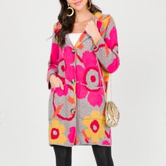 The Happy Flower Cardigan Is A Total Show-Stopper Featuring Bright, Bold Colors And This Cardi Sure Knows How To Keep Winter Blues At Bay! Plus, It's As Soft And Cuddly As Your Fave Blanket Great For Lounging Features Relaxed Fit Tortoise Button Closures Medium Weight Knit Collared Neckline Front Oversized Pouch Pockets Fabric 100% Polyester Stretch Fabric/Non-Sheer New In For Fall Boutique Item Winter Floral Print Pink Outerwear, Winter Pink Floral Print Outerwear, Winter Pink Outerwear With Floral Print, Pink Floral Print Sweater For Spring, Pink Floral Print Outerwear For Fall, Pink Floral Print Long Sleeve Cardigan, Pink Long Sleeve Floral Print Cardigan, Long Sleeve Pink Floral Print Cardigan, Pink Sweater Coat For Spring