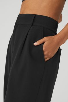 Your wildest trouser dreams just came true. The High-Waist Dreamscape Trouser takes the iconic pleated trouser silhouette to the next level—it’s done in lightweight crinkle woven fabric that breathes, moves, and turns heads wherever you go. Layer over a bodysuit or pair with the matching Dreamscape Button Down Long Sleeve. Versatile Alo Yoga Bottoms, Alo Yoga Relaxed Fit Wide Leg Bottoms, Alo Yoga Wide Leg Pants With Elastic Waistband, Versatile Solid Color Alo Yoga Bottoms, Relaxed Fit High Waist Bottoms With Pleated Waist, High-waisted Black Pleated Pants, High Waist Black Pleated Pants, High Waist Spring Bottoms By Alo Yoga, High Waist Bottoms With Pleated Waist And Relaxed Fit