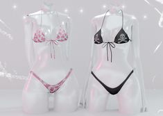 two white mannequins with pink and black bras