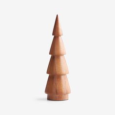 a wooden christmas tree on a white background