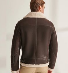 Men's White Sheepskin Leather Jacket In Dark Brown This men's sheepskin leather jacket adds a luxurious touch to any outfit. It features a faux shearling inner shell, which is fully lined with tissue paper, and finished with a smooth outer surface. The jacket's design is defined by its shoulder pads and interior pockets that complement the sleek look of this jacket. Wear it alone or layer it over other clothes for a super casual look. Outer Shell: Full Grain Leather Leather Type: Sheepskin Leather Finish: Semi-aniline Inner Shell: Faux Shearling Feature: Straps On The Collar Closure Style: Zipper Collar Style: Turn Down Cuffs Style: Open Hem Inside Pockets: Two Outside Pockets: Two Side Pockets Color: Dark Brown Leather Aviator Jacket, Aviator Leather Jacket, Leather Shorts Women, Short Leather Skirts, Leather Jumpsuit, Fur Jackets, Aviator Jacket, Fur Leather Jacket, Shearling Vest