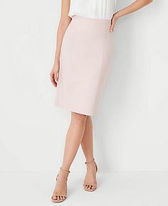 Elevate your wardrobe with the Ann Taylor Petite High Waist Seamed Pencil Skirt, a perfect blend of style and comfort. This skirt is meticulously designed to flatter with its high-waisted silhouette and precise seaming, ensuring a sleek and sophisticated look.

- Size: Petite 14
- Color: Pink Dust
- Material: 78% Cotton, 20% Rayon, 2% Spandex
- Length: 23 inches long
- Features: Hidden back zipper with hook-and-eye closure, back vent, fully lined
- Care: Machine washable

Ideal for both office a High Waist Pencil Skirt, Ann Taylor Petite, Pencil Silhouette, Knitted Suit, High Waisted Pencil Skirt, Double Knitting, Stretch Cotton, Effortless Style, Ann Taylor