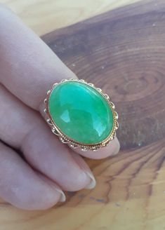 ATTENTION BUYERS.. PLEASE READ ANNOUNCEMENT IN MY SHOP. it's very important information there about purchasing items. Must purchase thru Etsy only, NOT from " Offsite ads"Beautiful 14k Yellow Gold Green Jade ring.. size 6. sizable all sales are final some pics ENLARGED to see details. Ring is in Good Pre Owned Condition.ATTENTION BUYERS ALL ITEMS FROM MY SHOP MUST BE PURCHASED STRAIGHT FROM ETSY, NOT FROM OFFSITE ADDS  All orders purchasing from Google and others will be cancelled Heirloom Jade Jewelry For Formal Occasions, Vintage Cabochon Emerald Ring For Wedding, Oval Jade Ring For Wedding, Classic Jade Jewelry For Wedding, Handmade Heirloom Oval Emerald Ring, Handmade Vintage Emerald Ring For Anniversary, Wedding Emerald Ring Oval Cabochon With Polished Finish, Vintage Emerald Ring With Polished Finish For Wedding, Oval Jade Wedding Ring