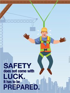 a man in safety gear is suspended from a crane