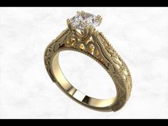 a gold engagement ring with an intricate design on the side and a round diamond in the center