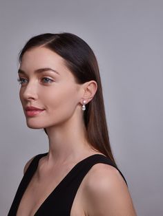 The Liz Teardrop Earrings are a timeless classic earring perfect for a bridal earring or black tie affair. 925 Rhodium Plated Sterling Silver.Handset Pear and Round Cut Flawless CZ Premium.Quality Grade 5A Cubic Zirconia.7/8th's of an inch long Elegant Timeless Design Earrings As Gift, Elegant Earrings With Timeless Design As Gift, Classic Cluster Earrings For Formal Occasions, Fine Jewelry Brilliant Cut Pearl Earrings For Evening, Evening Fine Jewelry Pearl Earrings With Brilliant Cut, Elegant Gift Earrings With Timeless Design, Classic Diamond Cluster Earrings For Formal Events, Classic Teardrop Diamond Earrings For Evening, Luxury Teardrop Bridal Earrings For Formal Occasions