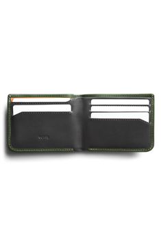 Hidden pockets provide some extra storage room in a super-slim wallet crafted from responsibly sourced, vegetable-tanned leather. Interior currency pouch; slip pockets; five card slots Leather Imported Secondary Packaging, Wallet Craft, Energy Use, Gift Kit, Diy Kits Gift, Storage Room, Slim Wallet, Nordstrom Store, Extra Storage