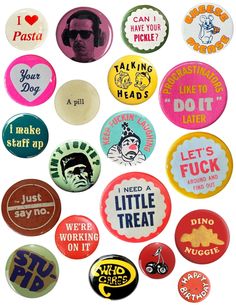 many different types of buttons on a white background, including one with the image of elvis presley