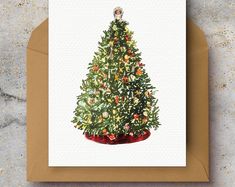 a card with a christmas tree on it