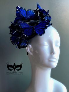 This elegant blue butterfly women's fascinator makes the perfect holiday gift! Featuring monarch butterflies in a variety of colors on a black fascinator base and headband/clip option. You have the option to pick other colors listed or a mix color option! I N C L U D E D Black fascinator on headband base topped with high-quality intricately detailed butterflies. In secure box packaging to keep form. S H I P P I N G - Processed same day or within 24 hours. 1-2 day guaranteed delivery, add item to Blue Adjustable Fascinator For Summer, Adjustable Blue Fascinator For Summer, Blue Mini Hat Headband For Spring, Adjustable Headpieces For Carnival, Blue Summer Headband Costume, Blue Spring Fascinator For Formal Occasions, Blue Headband Hat For Kentucky Derby, Blue Costume Hats And Headpieces For Races In Spring, Blue Summer Costume Hats And Headpieces For Party