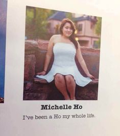 a woman sitting on top of a bench next to a sign that says, i've been a ho my whole life