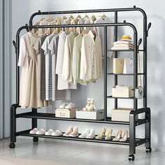 an iron rack with shoes and clothing on it