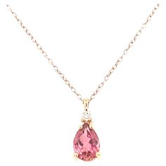 Discover our magnificent rose gold pendant necklace, featuring a tourmaline and a diamond from the French collection of Mesure et Art du Temps. This exquisite jewel combines elegance and discretion, while making a remarkable impression. The necklace features a delicately surmounted tourmaline, measuring 0.8 cm long and 0.5 cm wide. This natural gemstone adds a subtle, captivating touch of color, bringing natural beauty to your outfit. The tourmaline is carefully selected for its exceptional qual Pink Tourmaline Jewelry, Rose Gold Pendant Necklace, French Collection, Asymmetrical Earrings, Tourmaline Jewelry, Follow Button, White Gold Chains, Rose Gold Pendant, Tourmaline Necklace