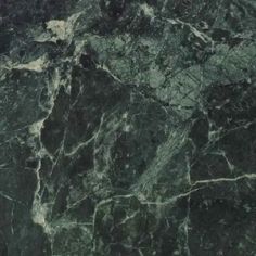 a black and green marble textured wallpaper or flooring with white vein on the edges