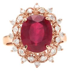 6.60 Carats Impressive Red Ruby And Diamond 14k Rose Gold Ring Suggested Replacement Value $4,800.00 Total Red Ruby Weight Is: Approx. 6.00 Carats (Lead Glass Filled) Ruby Measures: 11 X 9mm Natural Round Diamonds Weight: Approx. 0.60 Carats (Color G-H / Clarity Si1-Si2) Ring Size: 7 (Free Re-Sizing Available) Ring Total Weight: 5.8 Grams Disclaimer: All Weights, Measurements And Colors Are Approximate And May Vary Slightly From The Listed Dimensions Or As Seen In The Image. All Pictures Are Magnified To Show The Smallest Of Details. Please, Refer To The Item Description For Actual Weight And Size Evaluation. Sku #1603 Luxury Rose Gold Ruby Ring With Vvs Clarity, Luxury Rose Gold Ruby Ring With Halo Setting, Formal Elegant 14k Rose Gold Ruby Ring, Elegant 14k Rose Gold Ruby Ring For Formal Occasions, Red Ruby Ring In 14k Rose Gold, Ruby Ring In 14k Rose Gold With Round Shape, Elegant Formal Ruby Ring In 14k Rose Gold, Formal Rose Gold Ruby Ring, Formal Rose Gold Ruby Ring With Diamond