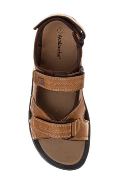 Head outdoors in this durable sandal constructed with adjustable hook-and-loop straps and a grippy rubber sole. Adjustable hook-and-loop strap Synthetic upper and lining/rubber sole Imported Summer Leather Hiking Sandals, Brown Open Toe Sport Sandals For Walking, Casual Leather Hiking Sandals, Cushioned Open Toe Sandals For Outdoor, Outdoor Open Toe Sandals With Cushioned Footbed, Brown Double Strap Sport Sandals With Cushioned Footbed, Brown Sport Sandals With Cushioned Footbed For Walking, Brown Hiking Sandals With Removable Insole, Casual Sandals With Buckle Closure And Adjustable Fit