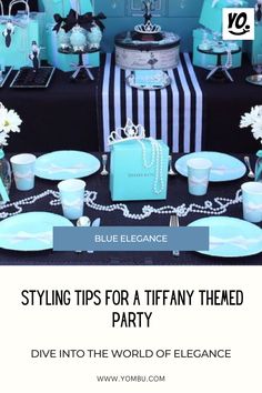 a table set up for a tiffany themed party with blue plates and silverware on it