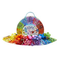 the rainbow craft kit is filled with pom poms