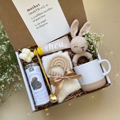 a mother's day gift box with tea, cookies and marshmallows