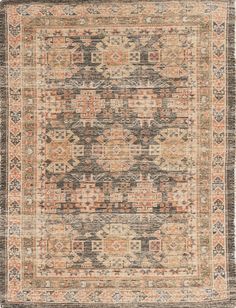 an antique rug with many different colors and patterns on the carpet, including oranges, browns