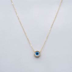 Elevate your style with our Evil Eye Gemstone Pave Pendant Necklace. Crafted in 10K solid gold, this captivating piece features a stunning Evil Eye symbol adorned with clear gemstones, combining fashionable allure with ancient protective symbolism. Necklace length: 16 - 17 1/4" adjustable Pendant size: 9 mm Clear Gemstones, Evil Eye Symbol, Eye Symbol, Gemstone Pendant Necklace, Pave Pendant, Gemstone Necklace Pendant, Necklace Length, 10k Gold, Gemstone Pendant