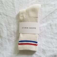 Stay fly all year long in these calf length sports socks. Pair with sneakers or sliders. 85% cotton 13% polyester 2% spandex One size fits most Made in Korea Machine wash Boyfriend Socks, Cheer Socks, Vintage Socks, Summer Favorites, Sports Socks, Mirrored Furniture, Comfy Clothes, Bath Linens, White Socks