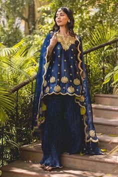 Navy blue banarasi chanderi kurta with marori and lace patchwork embroidery. Paired with scallop edge embroidered dupatta and crushed sharara. - Aza Fashions Blue Dola Silk Palazzo Set With Straight Kurta, Royal Blue Sharara With Zari Work, Royal Blue Designer Sharara, Designer Wear Banarasi Silk Palazzo Set, Designer Banarasi Silk Palazzo Set In Traditional Drape, Designer Blue Dola Silk Palazzo Set, Blue Art Silk Palazzo Set For Wedding, Blue Palazzo Set With Dupatta For Wedding, Designer Wear Royal Blue Sharara For Festivals