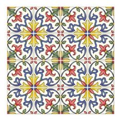 an artistic tile design with colorful flowers and leaves