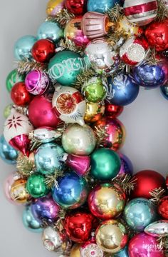 a wreath made out of christmas ornaments