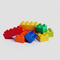 colorful lego blocks on white background stock photo, a picture of a colorful lego blocks on white