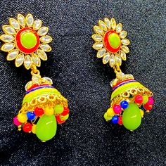 Beautiful Hand Painted Earrings Very Elegant And Beautiful Colorful Traditional Earrings, Green Earrings With Latkans For Party, Green Drop Earrings For Festivals, Green Drop Earrings Danglers For Festivals, Green Latkan Earrings For Party, Multicolor Round Danglers For Celebration, Yellow Earrings For Party And Festivals, Green Round Earrings For Festivals, Green Festive Earrings For Festivals