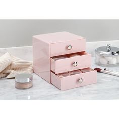 iDesign's 3-Drawer Jewelry Box is ideal for any room in your home. Organize your jewelry, cosmetics, office supplies, and more for easy access. Made of durable pink plastic with chrome knobs, this organizer is perfect for storing your jewelry, makeup brushes, cosmetics, office supplies, crafting tools, knick knacks, and more. Use this storage organizer in your bedroom, bathroom, office, or on your vanity, desk, or nightstand. Measuring 6.5" x 6.5" x 6.5", this 3-Drawer Organizer is perfect for o Money Box Ideas, Coquette Lifestyle, Cute Office Decor, Wooden Desk Organizer, Dream Dorm, Desktop Drawers, Drawer Desk, Desk Organizer Set, Office Supply Organization