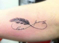 a woman's arm with a tattoo that says love and an arrow on it