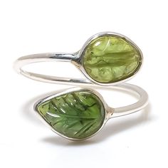 *N A T U R A L  B A G U E T T E ∙ S T O N E ∙ R I N G* PERIDOT:-  Peridot is a gem with significant historical ties, adorning some of the world's most beautiful royal and sacred objects. Peridot colors vary between greenish yellow, yellow-green, yellowish, green, and olive green.  From Neckletsn Experience stunning jewelry that compliments your style every day any time, All the items in my shop are handmade and are crafted by our best workers in our workshop, We pay a lot of emphasis on the making of the ring and we always assure you that we will provide the best quality products every time. Each piece is completely handmade.   Material: High Quality Solid 925 Sterling Silver, Neckletsn is making a different product. Durable and healthy, longer lasting for daily wear. High-polish finished Green Sterling Silver Nature-inspired Ring, Green Sterling Silver Stackable Open Rings, Green Nature-inspired Sterling Silver Rings, Green Stackable Sterling Silver Rings, Adjustable Green Hallmarked Jewelry, Sacred Objects, Peridot Color, Yellowish Green, Big Rings