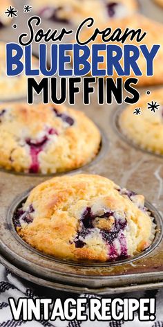 blueberry muffins in a muffin tin with text overlay that reads sour cream blueberry muffins vintage recipe