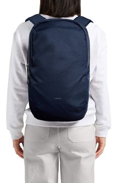 An ideal backpack for students and commuters, this minimalist, water-repellent backpack has all interior storage and a padded compartment for larger laptops. Two-way top-zip closure Top carry handle; adjustable backpack straps Interior zip-mesh and sunglasses pockets; key clip Padded compartment fits most 16" laptops Water-repellent Textile Imported Casual Navy Backpack Bag, Navy Backpack With Adjustable Strap For Everyday Use, Casual Navy Nylon Backpack, Navy Standard Backpack With Adjustable Strap, Navy Standard Backpack For On-the-go, Backpack Straps, Repellent, Water Repellent, Laptop