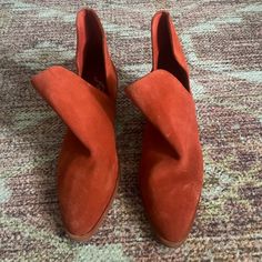 Never Worn. Burnt Orange Suede Ankle Booties With Slight Heel. Size 37 Eu/6.5 Us. Some Weathering In The Suede In The Front Of The Boot As Pictured. Slip-on Suede Booties Medium Width, Spring Suede Booties With Almond Toe, Spring Suede Slip-on Booties, Slip-on Booties With Stacked Heel, Medium Width, Slip-on Booties With Stacked Heel, Slip-on Booties With Stacked Heel And Medium Width, Suede Booties With Stacked Heel And Pointed Toe, Free People Shoes, Burnt Orange