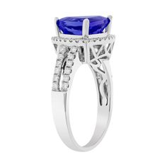 9.50mmmm Violetish Blue AAAA Tanzanite Ring Trillion shape 3.49 ct with 0.42 cttw Diamond in 14K White Gold Product Information SKU TTJ13921 Metal Type 14K Metal Color White Gold Ring Style Halo Primary Stone Gemstone Name Tanzanite Gemstone Species Zoisite No. of Gemstones 1 Gemstone Grades AAAA Gemstone Shape Trillion Gemstone Weight 3.49 Gemstone Size 9.50mm Origin Tanzania Secondary Stone Gemstone Name Diamond Gemstone Species Diamond No. Of Gemstones 48 Gemstone Grades - Gemstone Shape Roun Tanzanite Ring, Tanzanite Gemstone, Ring Style, White Gold Ring, Metal Color, Diamond Gemstone, White Gold Rings, Gold Ring, Types Of Metal