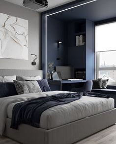 a bedroom with a large bed and blue walls